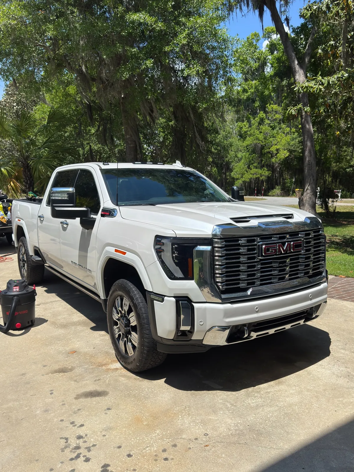 White GMC heavy duty truck after a detail