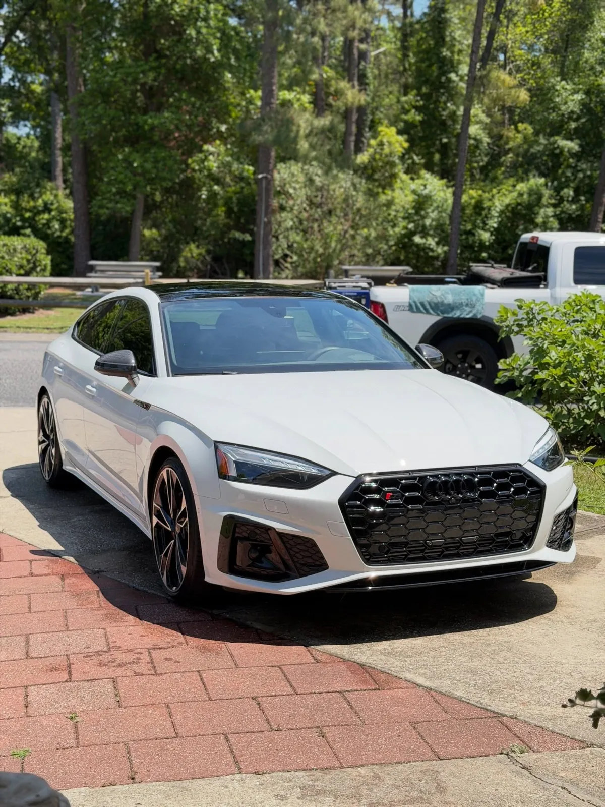 White Audi A5 Sportback in a driveway