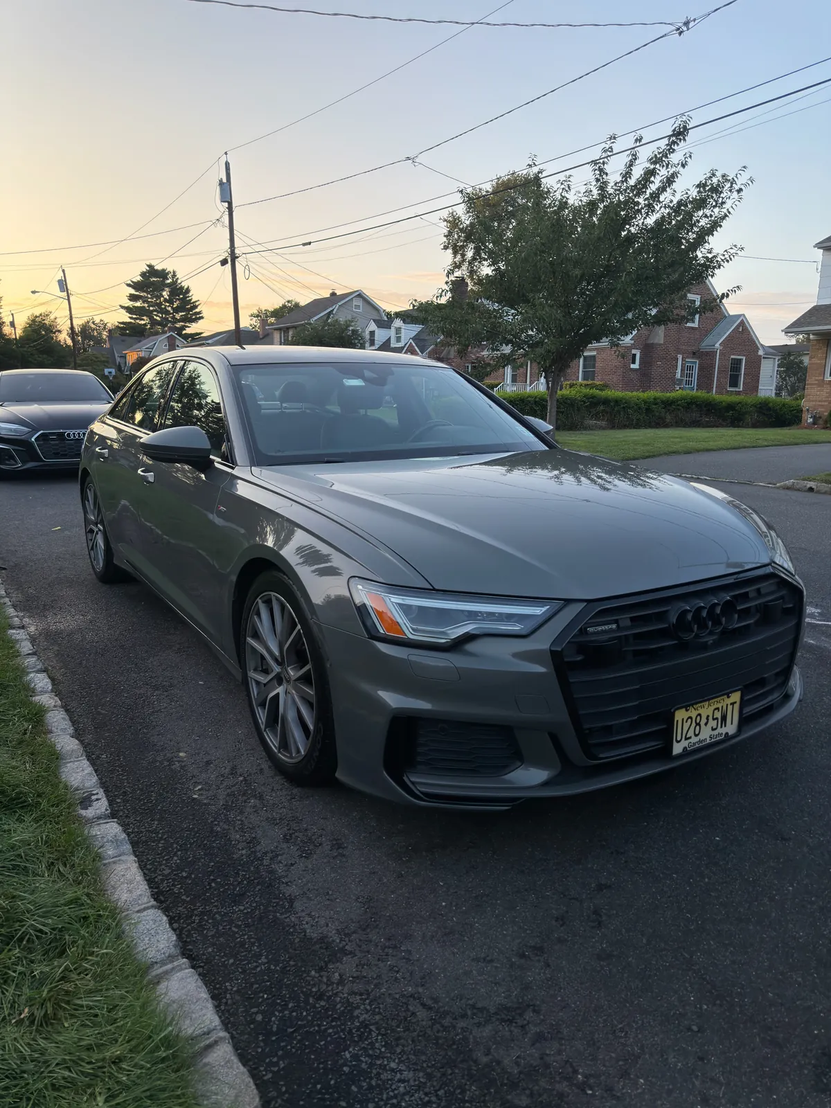 Grey Audi A6 on a residential street